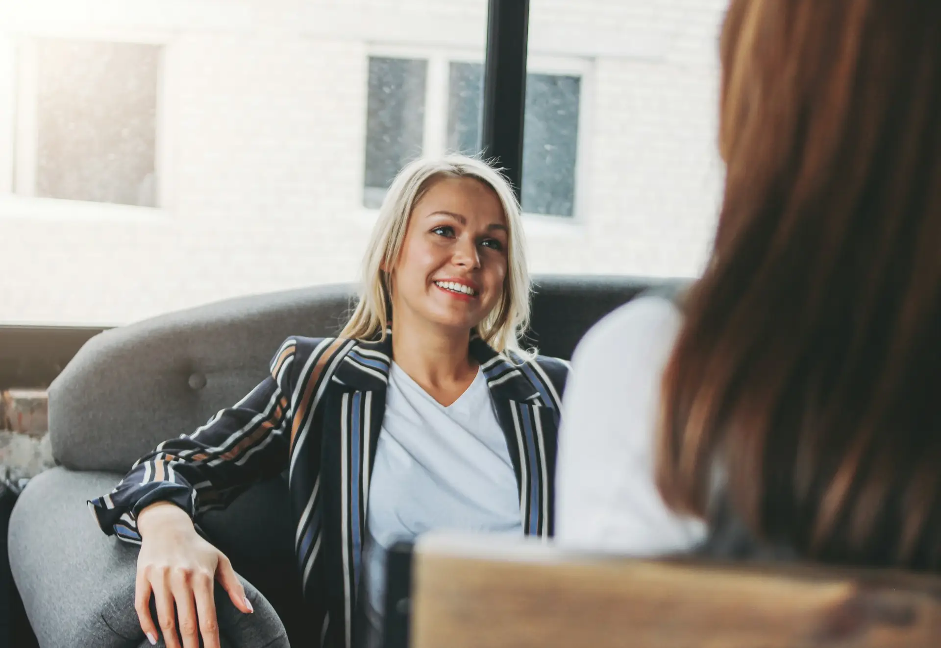 Young woman with psychologist